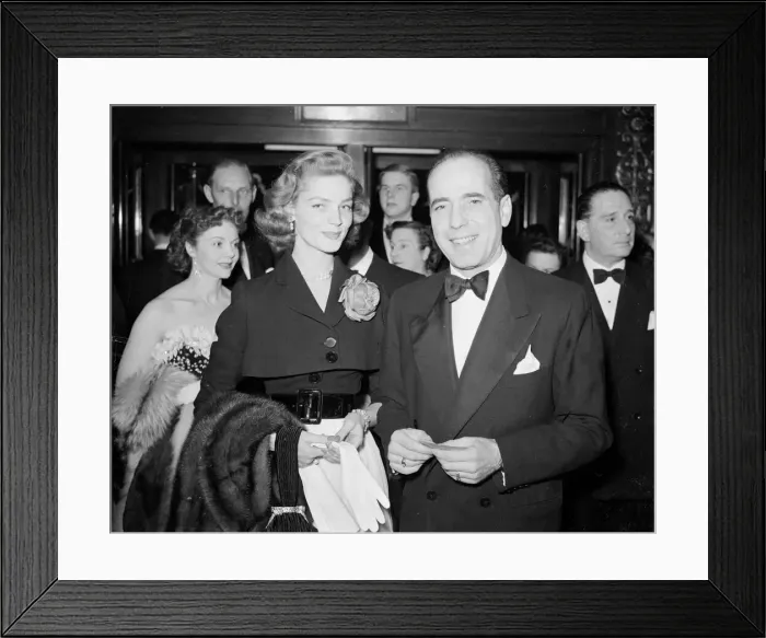 Framed Print : Humphrey Bogart with his wife Lauren Bacall at a film premiere film premier Framed Print : Humphrey Bogart with his wife Lauren Bacall at a film premiere film premier