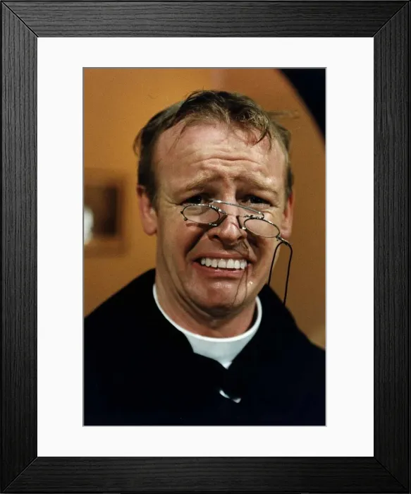 Framed Print : Les Dennis Comedian and TV presenter in one of his comedy roles as a vicar Framed Print : Les Dennis Comedian and TV presenter in one of his comedy roles as a vicar