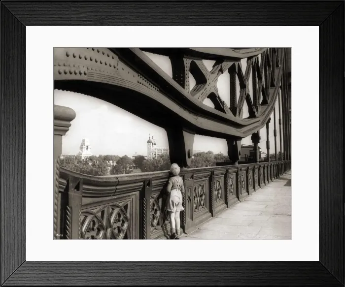 Framed Print : A young boy on tip toes to get a view from the bridge - 1959 Framed Print : A young boy on tip toes to get a view from the bridge - 1959