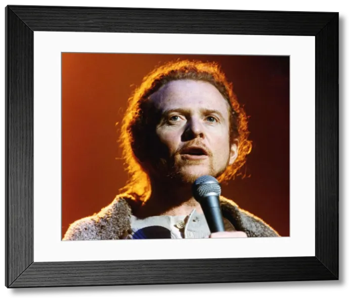 Framed Print : Mick Hucknall lead singer of Simply Red in Concert