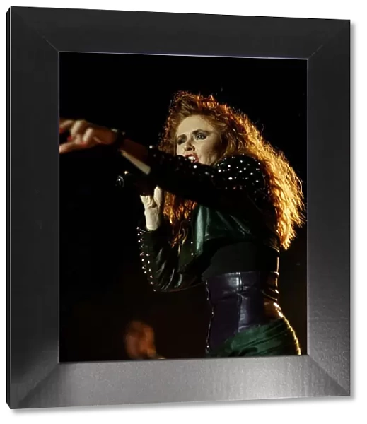 Carol Decker Singer from the pop group TPau singing on stage