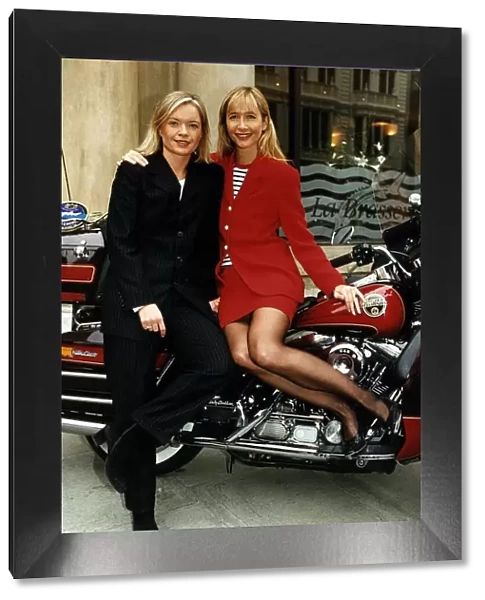 Tania Bryer TV Presenter of ITV with co-presenter Mariella Frostrup sits on Harley