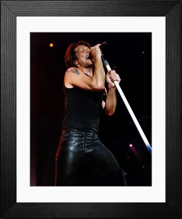 Framed Print : Jon Bon Jovi Pop Singer for Bon Jovi group on stage singing into microphone Framed Print : Jon Bon Jovi Pop Singer for Bon Jovi group on stage singing into microphone