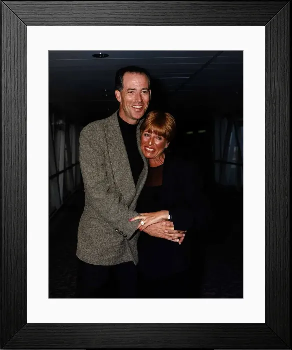 Framed Print : Michael Barrymore Comedian & TV Presenter with wife Cheryl at Heathrow Airport Framed Print : Michael Barrymore Comedian & TV Presenter with wife Cheryl at Heathrow Airport