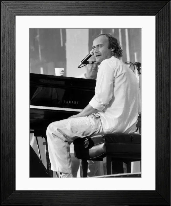 Framed Print : Phil Collins pop singer at Live Aid Concert 1985 JFK Stadium Philadelphia Framed Print : Phil Collins pop singer at Live Aid Concert 1985 JFK Stadium Philadelphia
