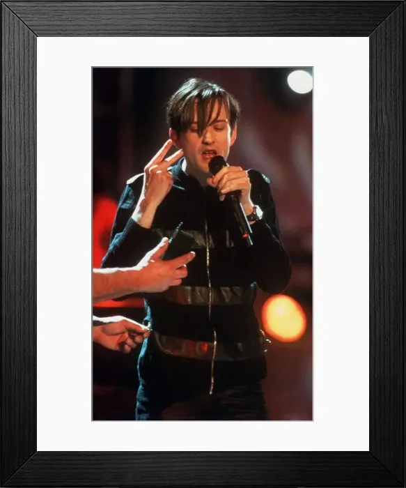 Framed Print : Jarvis Cocker lead singer of Pulp on stage 1996