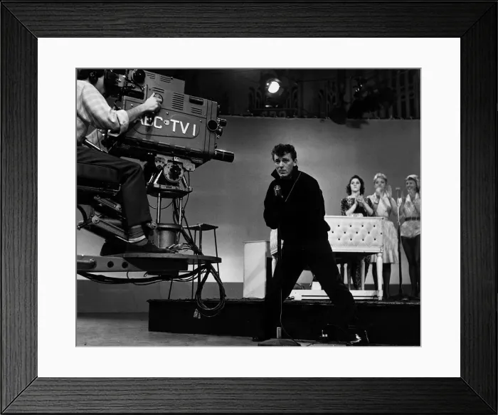 Framed Print : The camera swings in to record American Fifties Sixties pop singer Gene Vincent