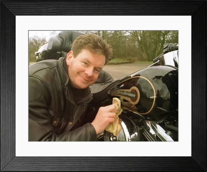 Framed Print : John Gordon Sinclair polishing his Harley Davidson March 1997 Framed Print : John Gordon Sinclair polishing his Harley Davidson March 1997