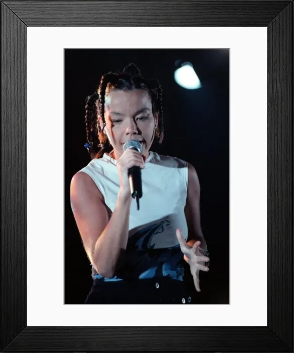 Framed Print : Bjork singer from Iceland on stage at the Irvine Festival with microphone in hand
