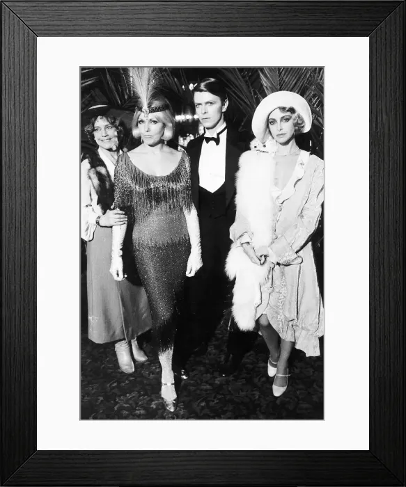 Framed Print : David Bowie rock star, singer and actor surrounded by the three leading lady stars in Framed Print : David Bowie rock star, singer and actor surrounded by the three leading lady stars in