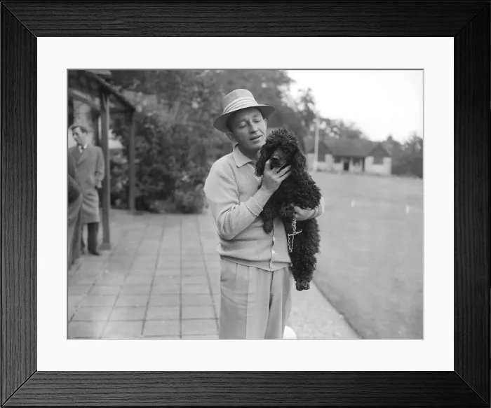 Framed Print : Bing Crosby holding a Poodle - September 1952 Framed Print : Bing Crosby holding a Poodle - September 1952