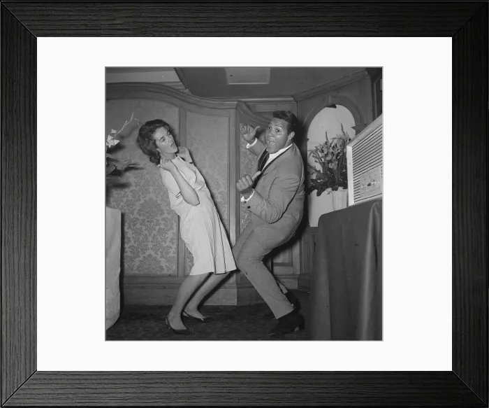 Framed Print : Chubby Checker showing how its really done - The Twist that is with a female