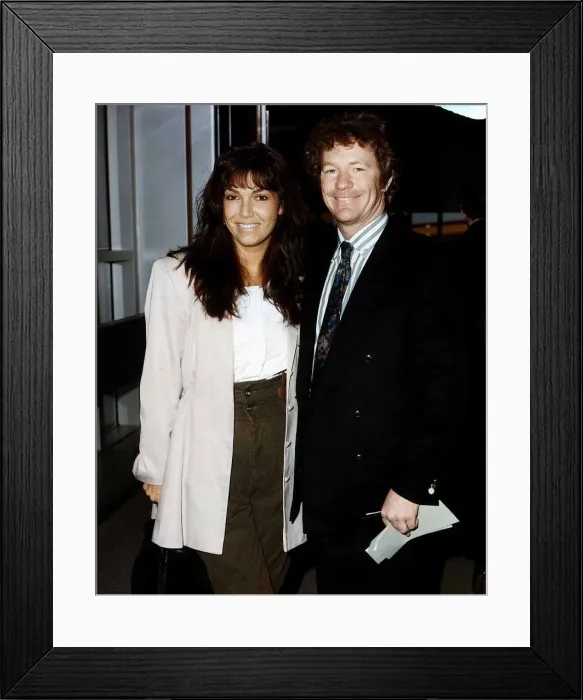 Framed Print : Jim Davidson TV Presenter and Comedian with wife Tracie Davidson at Heathrow Airport Framed Print : Jim Davidson TV Presenter and Comedian with wife Tracie Davidson at Heathrow Airport