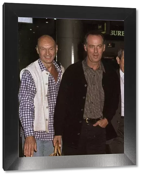 Michael Barrymore TV Presenter with Maurice Leonard Producer leaving Heathrow for Chicago