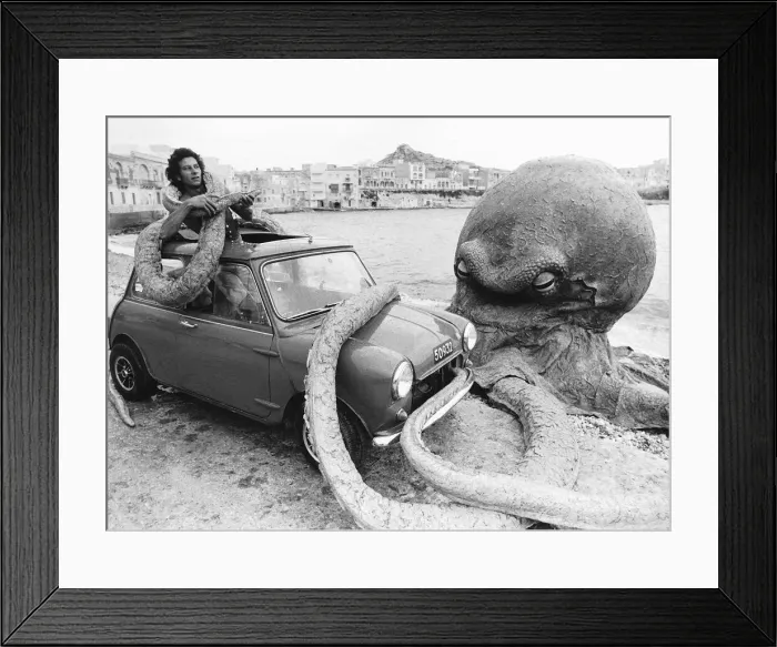 Framed Print : Roy Bella battles with an Octopus on beach in Malta stars in film Seven Cities to