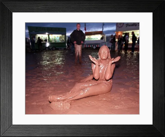 Framed Print : T in the Park July 1997 A music fan covered in mud at the T in the Park music festival Framed Print : T in the Park July 1997 A music fan covered in mud at the T in the Park music festival