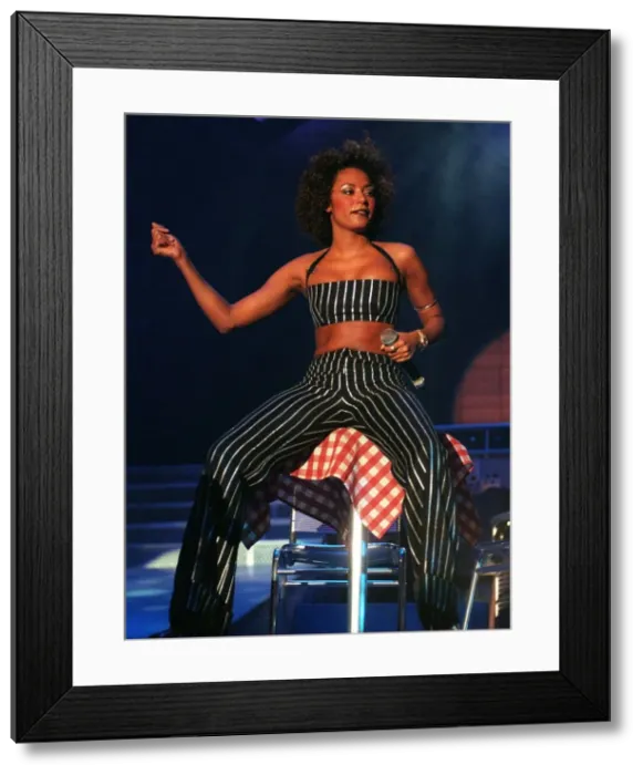 Framed Print : Mel B of The Spice Girls on stage at Glasgow SECC April1998 singing into microphone Framed Print : Mel B of The Spice Girls on stage at Glasgow SECC April1998 singing into microphone