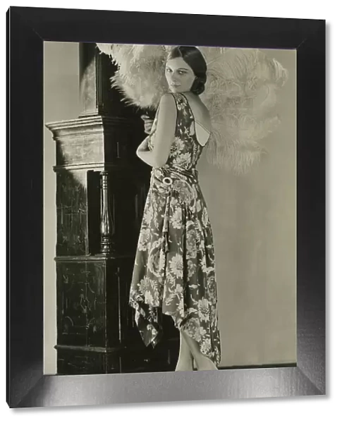 Fashion 1920s - September 1928 An evening gown of new soft taffeta in dark blue
