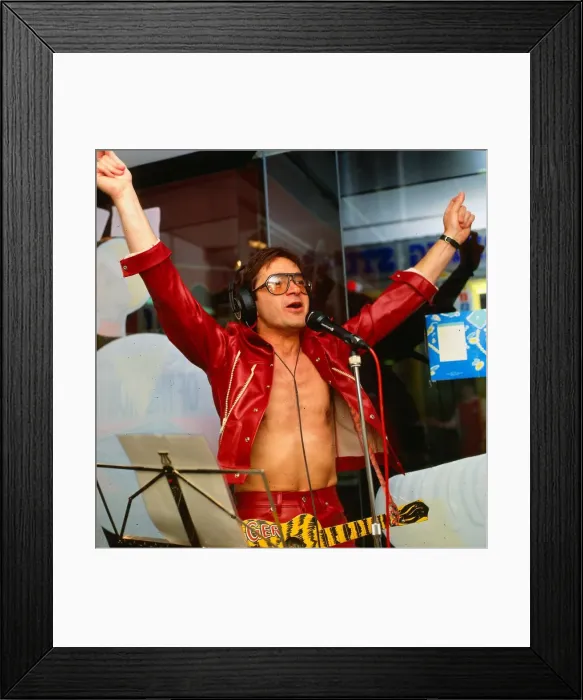 Framed Print : Tiger Tim Stevens DJ disc jockey July 1988 signign into microphone wearing red leather