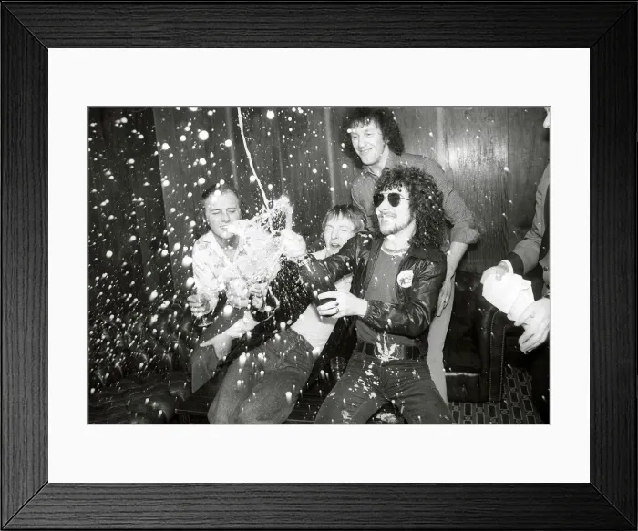 Framed Print : Pop band Black Lace enjoy a bottle of champagne after victory in the Eurovison song Framed Print : Pop band Black Lace enjoy a bottle of champagne after victory in the Eurovison song