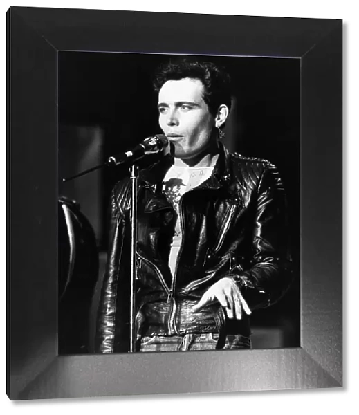Adam Ant British pop singer singing on stage 1984