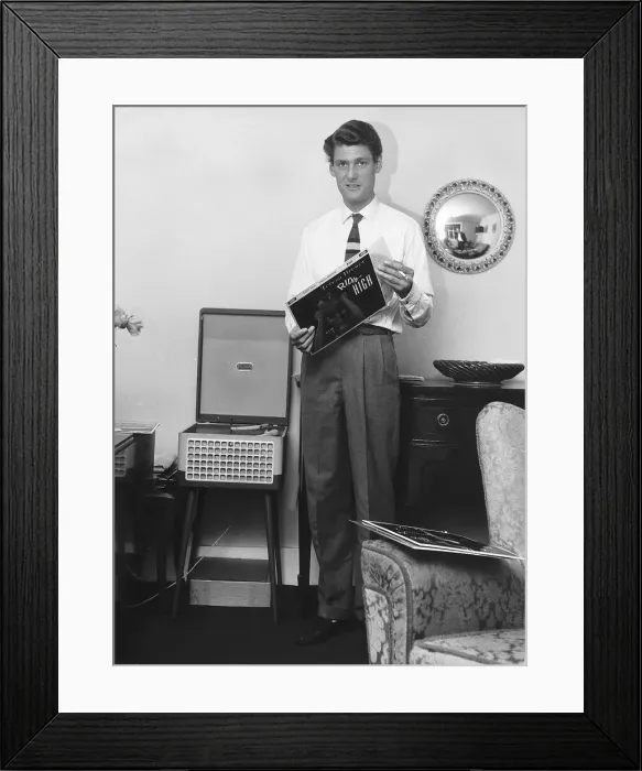 Framed Print : Pete Murray Disc Jockey 33 browsing through his records at home in his flat Framed Print : Pete Murray Disc Jockey 33 browsing through his records at home in his flat