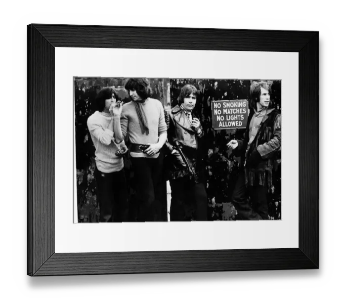 Framed Print : British Sixties pop group The Troggs smoking next to no smoking sign