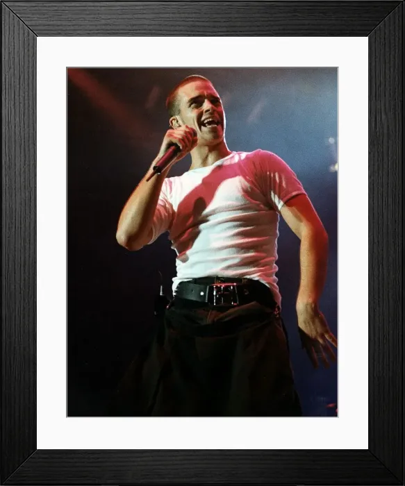Framed Print : Robbie Williams performing on stage during the the first night concert of Take That Framed Print : Robbie Williams performing on stage during the the first night concert of Take That