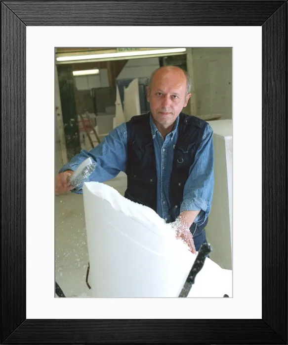 Framed Print : John Blakeley movie special effect sculptor July 1999 working on a polystryrene Framed Print : John Blakeley movie special effect sculptor July 1999 working on a polystryrene