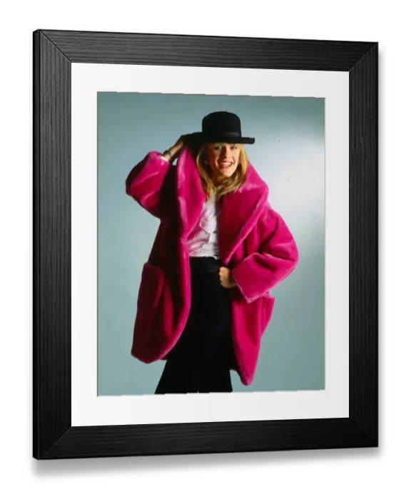 Framed Print : Carol Smillie model TV presenter wearing pink fake fur coat and black hat