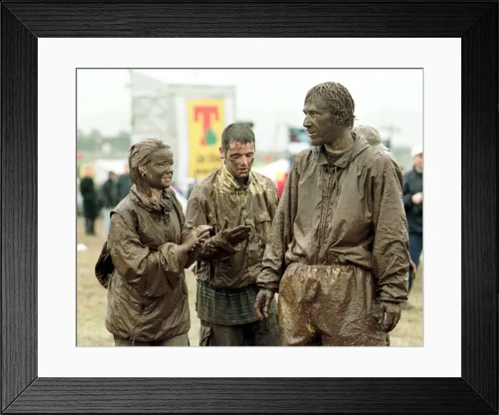 Framed Print : T in the Park Concert in Balado, Scotland July 1998 Festival goers covered in mud Framed Print : T in the Park Concert in Balado, Scotland July 1998 Festival goers covered in mud