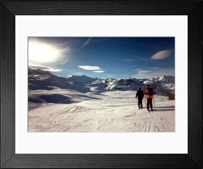 Framed Print : Skiers overlook the French Alps at Val D Isere February 1999