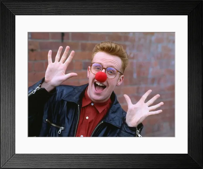 Framed Print : TV presenter Bryan Burnett wearing a red nose 1990