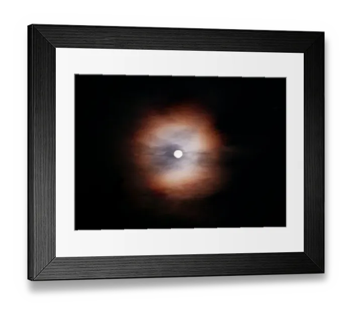  : The Moon behind clouds in Italy August 1997