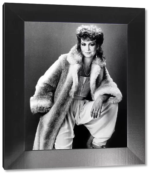 Susan Penhaligon, film actress December 1981 wearing and modelling fake fur coat from C&A