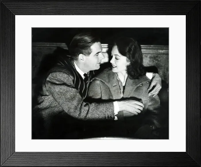 Framed Print : Ian Carmichael and Janette Scott seen here cuddling on the back row of the cinema Framed Print : Ian Carmichael and Janette Scott seen here cuddling on the back row of the cinema