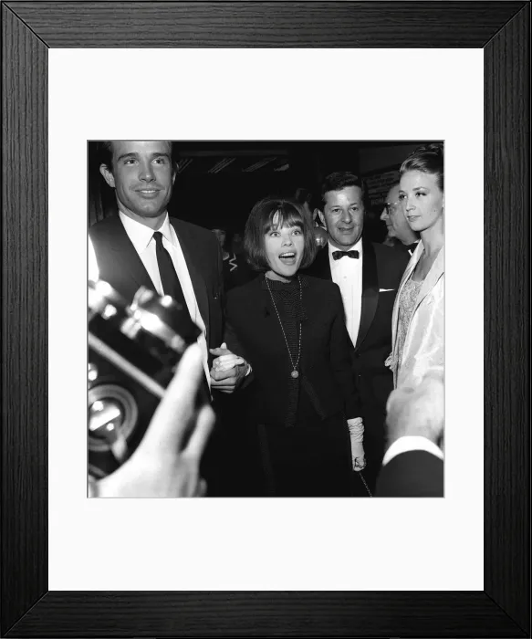 Framed Print : Warren Beatty actor and actress Leslie Caron June 1965 arrive for the premiere of