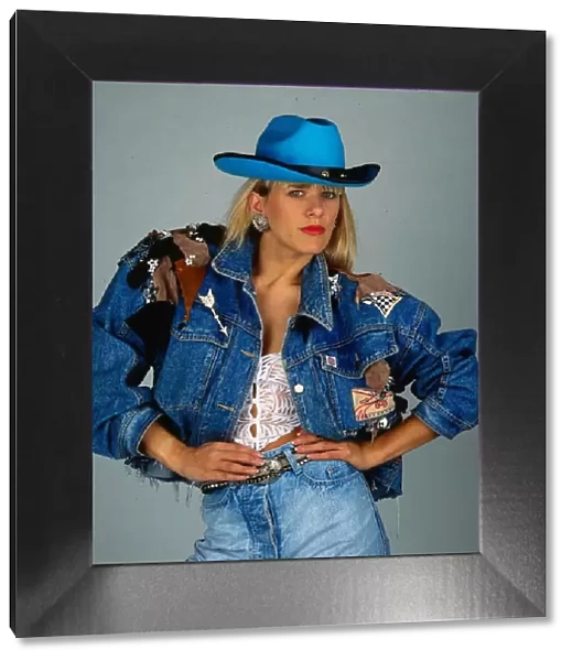 Carol Smillie model TV Presenter wearing blue cowboy hat denim jacket and white lace top