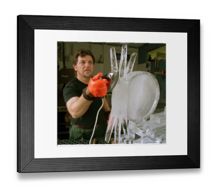 Framed Print : Duncan Hamilton Ice Sculptor August 1999, at work on a piece for a Eclipse party to be Framed Print : Duncan Hamilton Ice Sculptor August 1999, at work on a piece for a Eclipse party to be