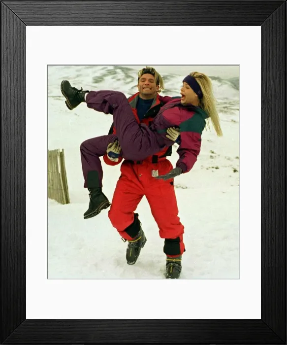Framed Print : Baywatch stars Gena Lee Nolin being carried by actor David Chokachi while visiting Framed Print : Baywatch stars Gena Lee Nolin being carried by actor David Chokachi while visiting