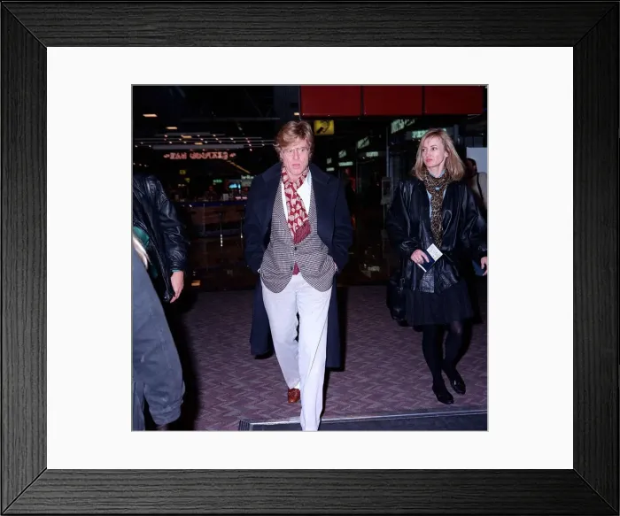 Framed Print : Robert Redford actor at London airport with unidentified womam