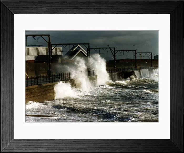 Framed Print : Waves crash against a wall at Solcots after heavy winds caused the sea to become rough Framed Print : Waves crash against a wall at Solcots after heavy winds caused the sea to become rough