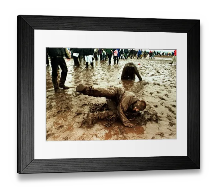 Framed Print : T in the Park Concert in Balado, Scotland July 1998 Festival goers covered in mud Framed Print : T in the Park Concert in Balado, Scotland July 1998 Festival goers covered in mud