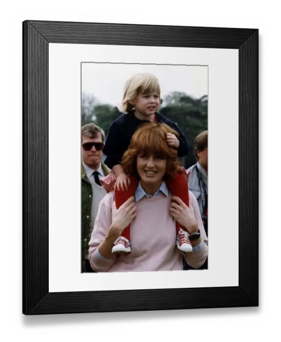  : Princess Beatrice being carried by her mother the Duchess of York