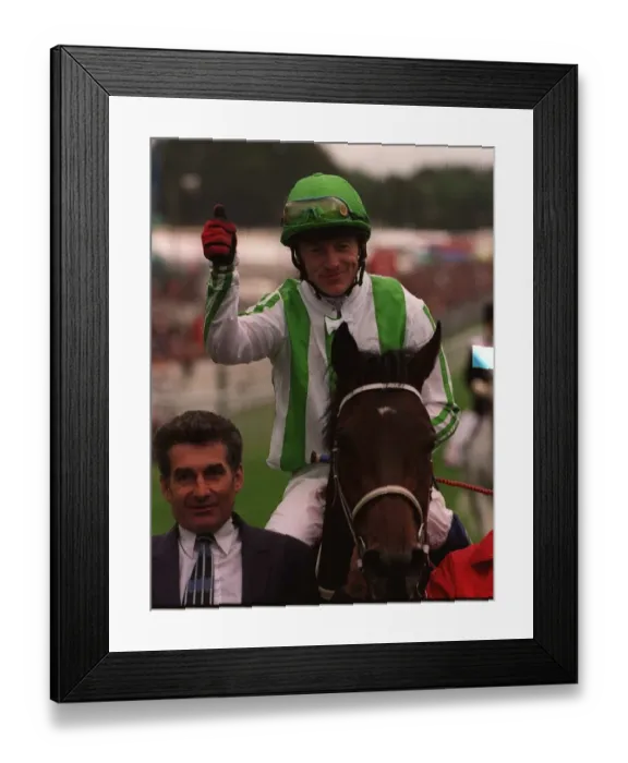 Framed Print : Oath ridden by jockey Kieren Fallon after winning the Derby at Epsom - June 1999