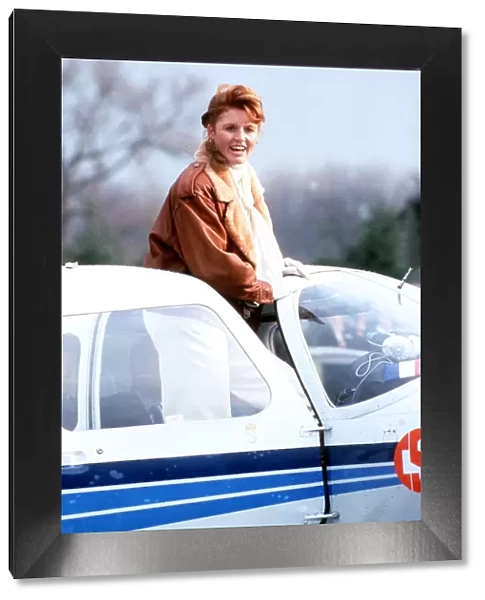 Duchess Of York getting out of her private plane to receive her private pilot