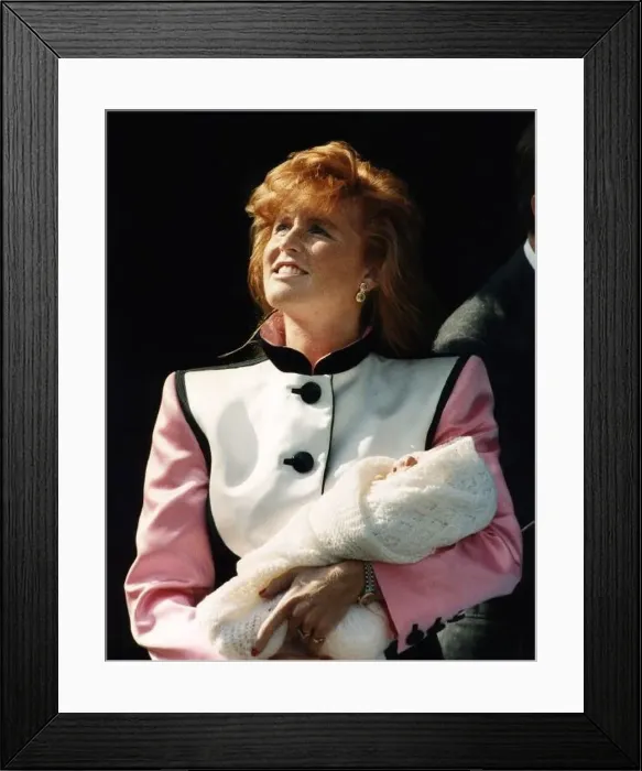 : Princess Eugenie being held by the duchess of york : Princess Eugenie being held by the duchess of york