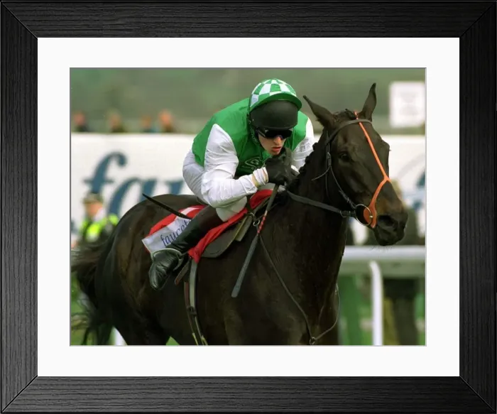 Framed Print : Strong Promise on the way to victory at Cheltenham 15th April 1997