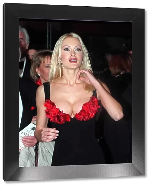 Caprice Bourret Glamour Model arriving at the screening of the film premiere Evita