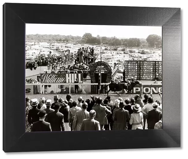 Minstrel and jockey Lester Piggott winning The Derby from Hot Grove for his record